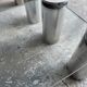 Pair of modernist coffee tables with cylindrical steel legs