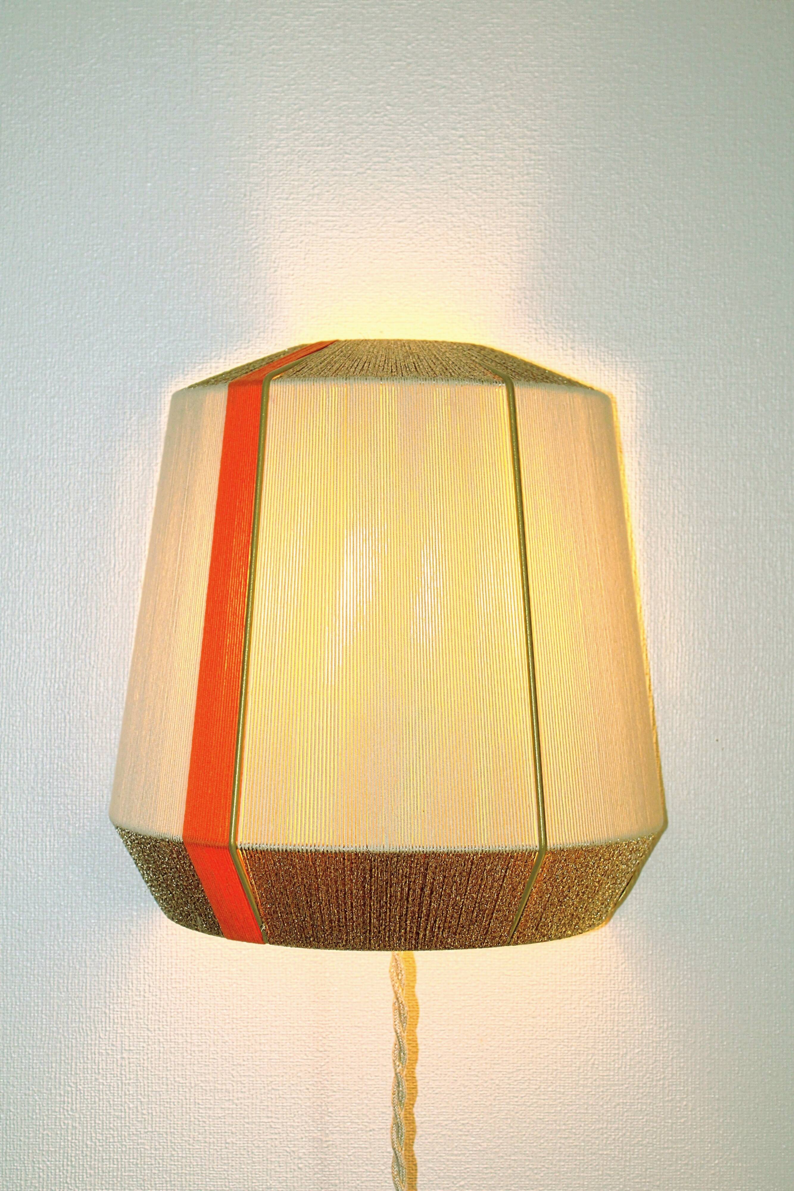 Colourful wall lamp L’Epicurienne gold – orange