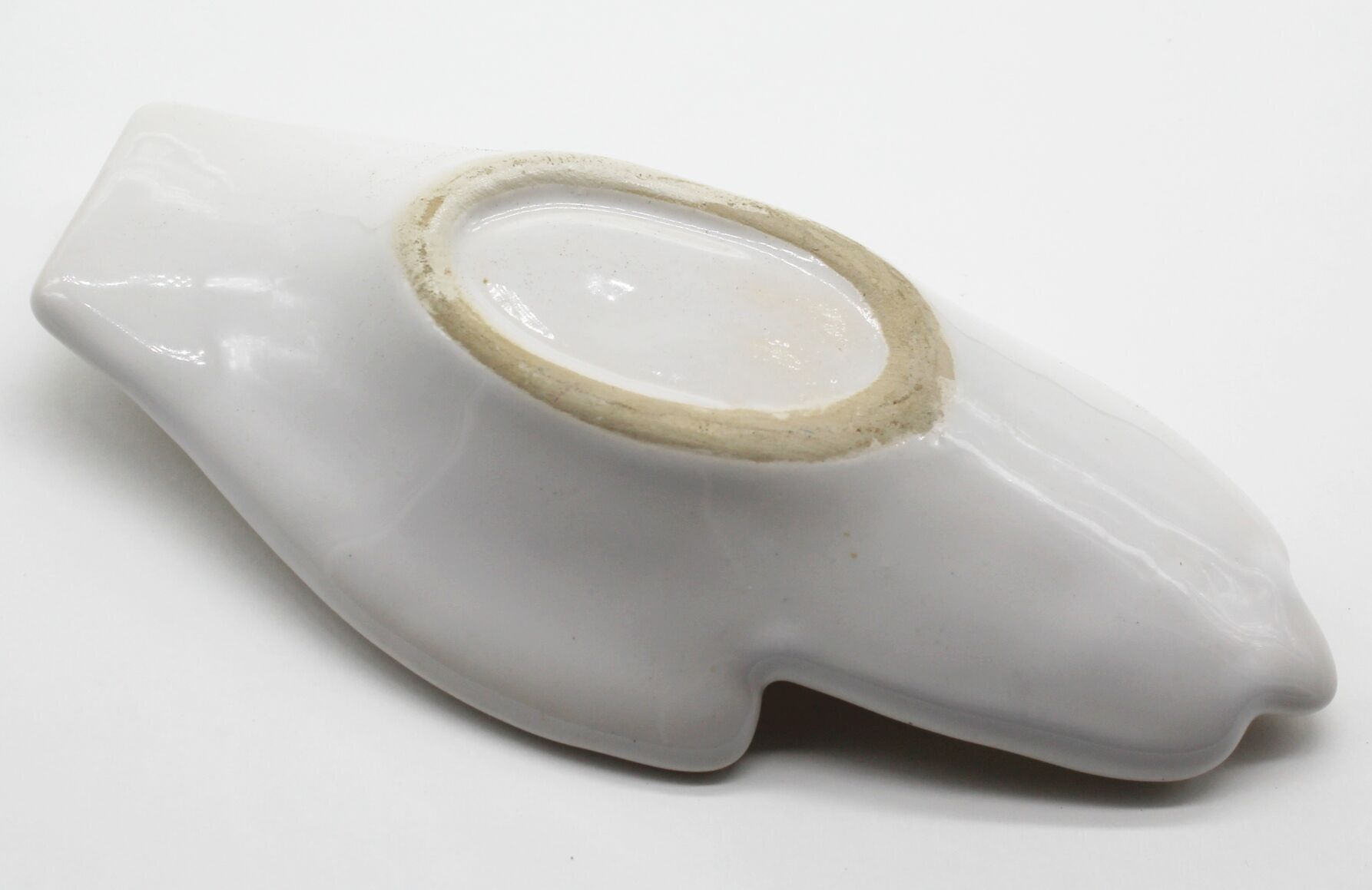 Empty white ceramic hand pocket