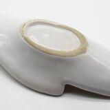 Empty white ceramic hand pocket