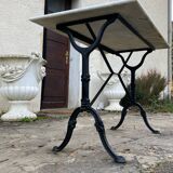 Bistro table with cast iron base, marble top, 20th century