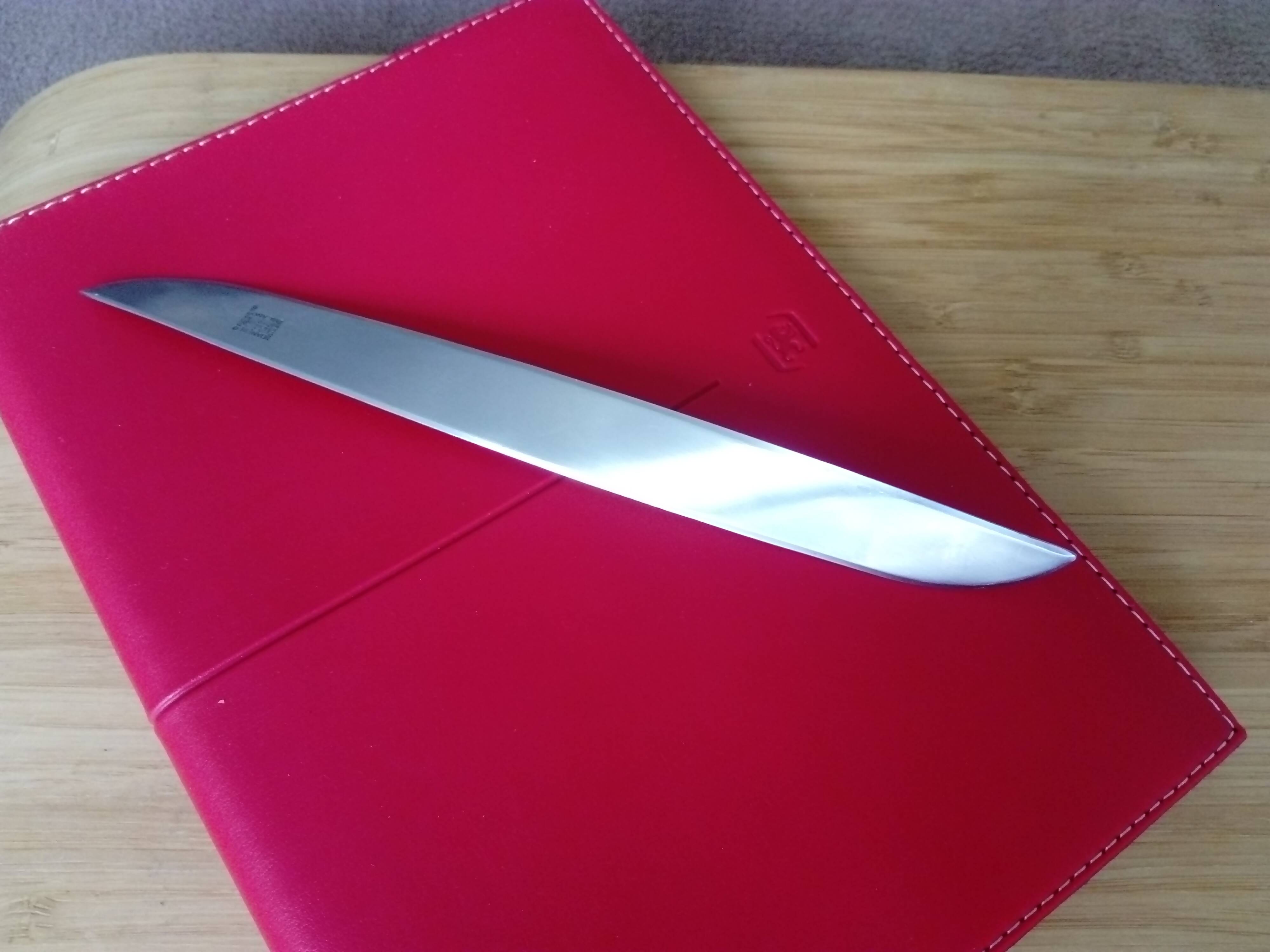 Steel paper cutter designed by Enzo Mari for Danese Milano