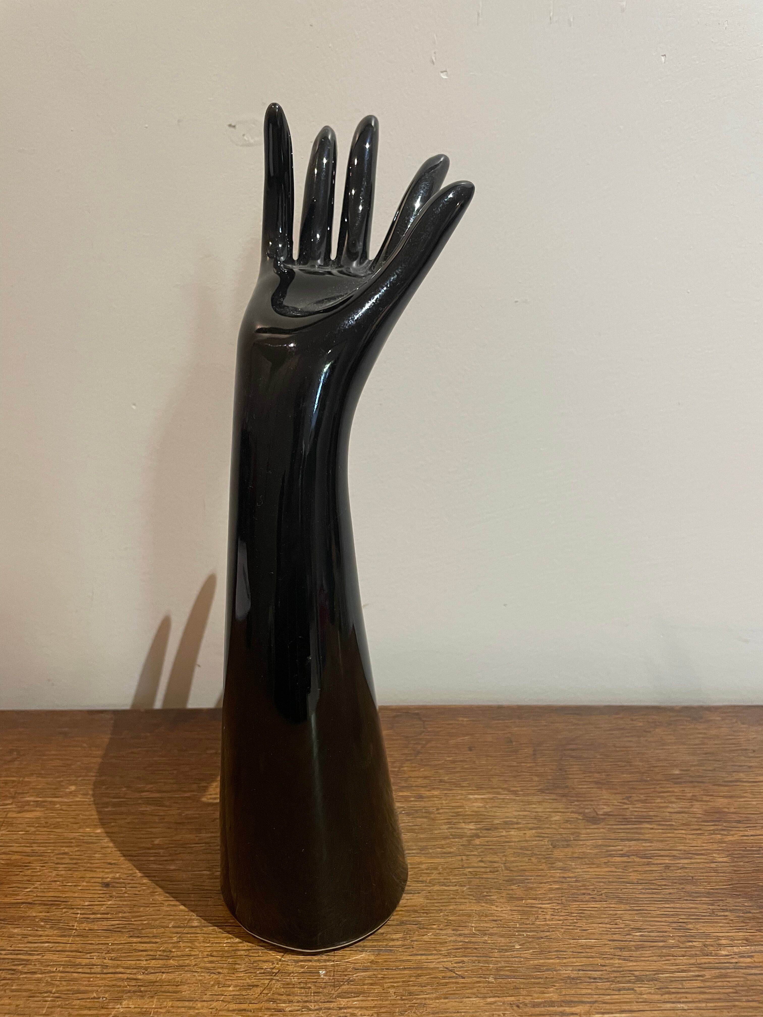 Black ceramic hand sculpture