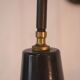 Antique cast iron wall bracket and enamelled globe, 1950s