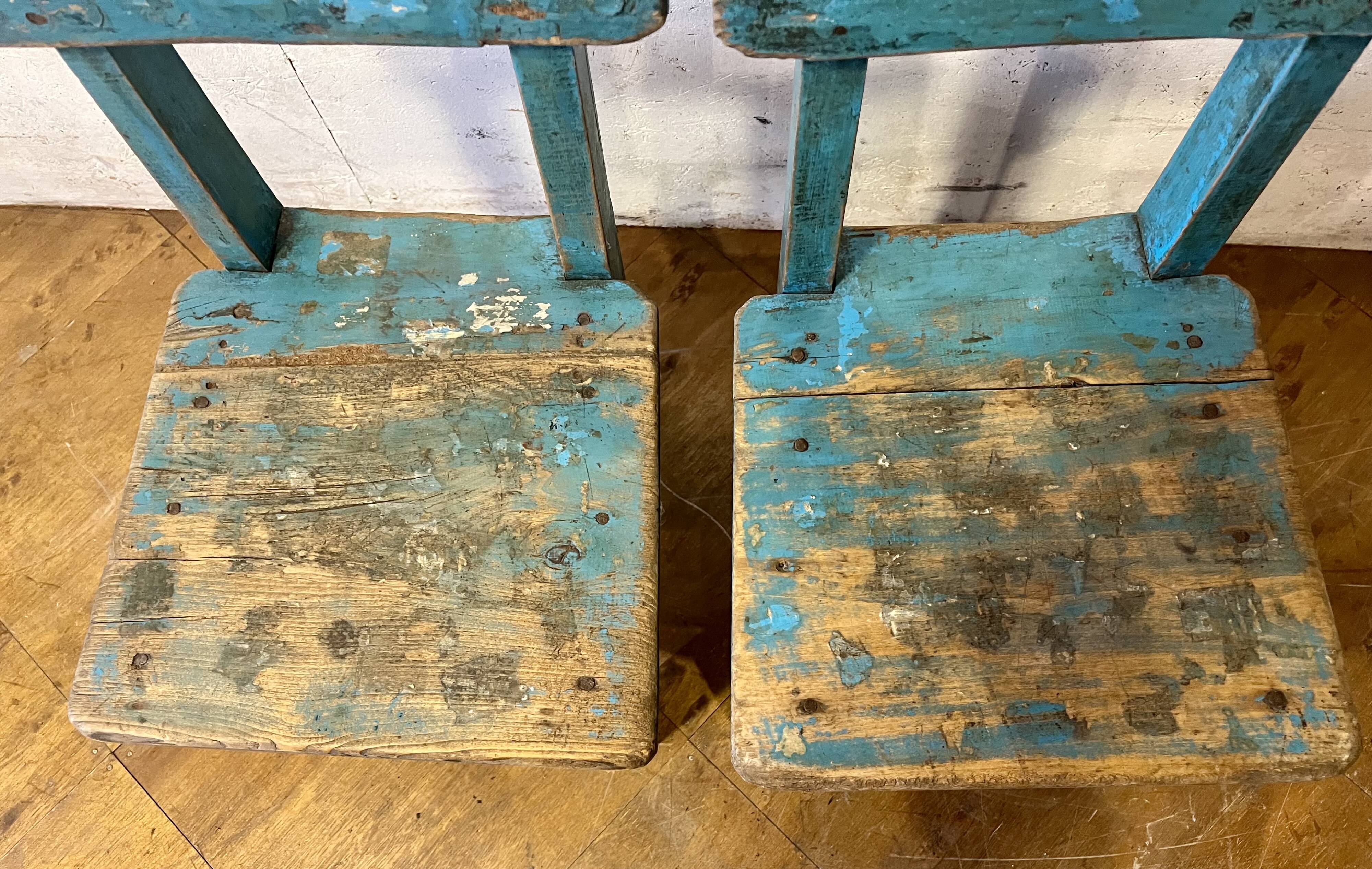 Old pair of small children's school chairs