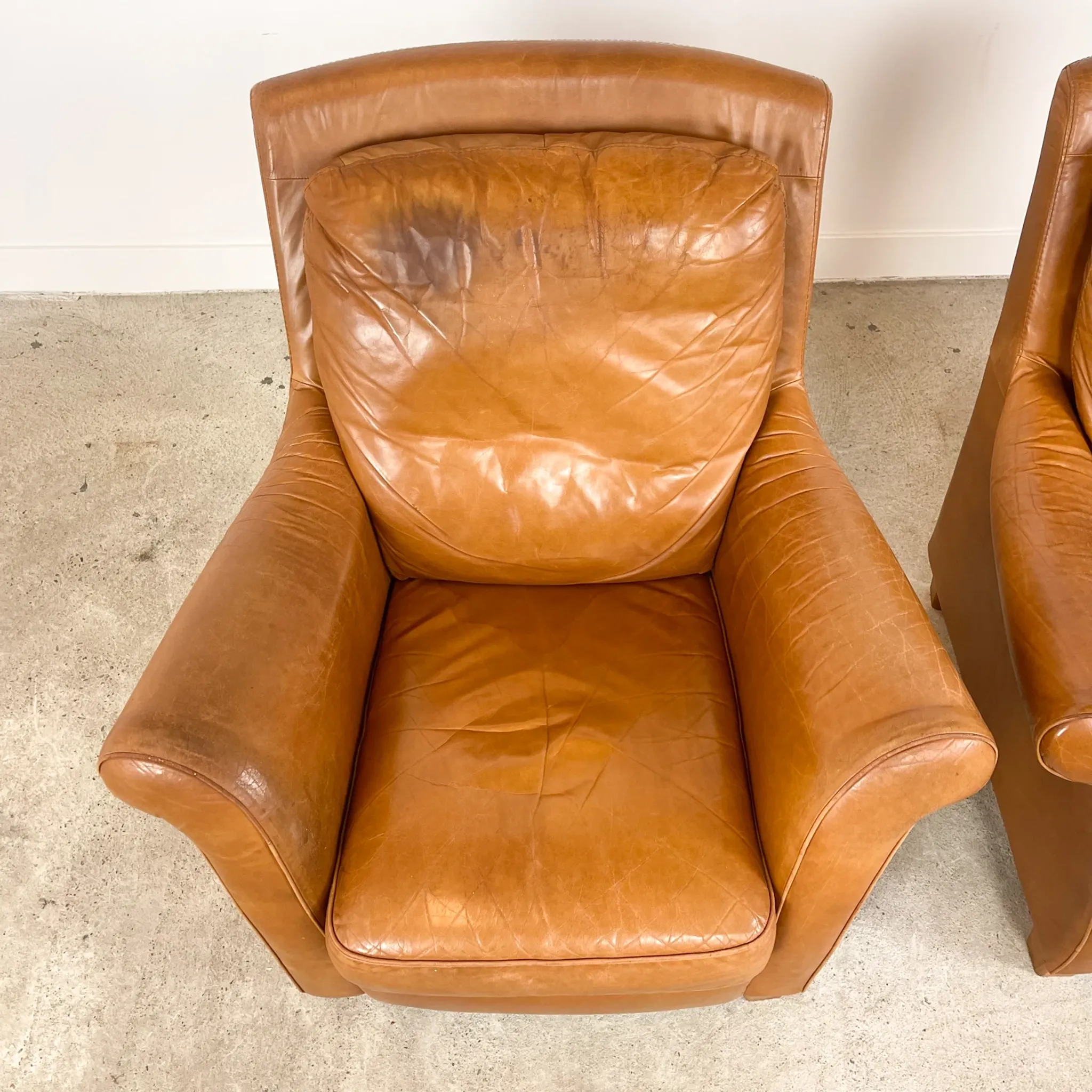 Ensemble de 2 fauteuils en cuir cognac vintage