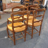 Set of 4 chairs in oak carved from 1950