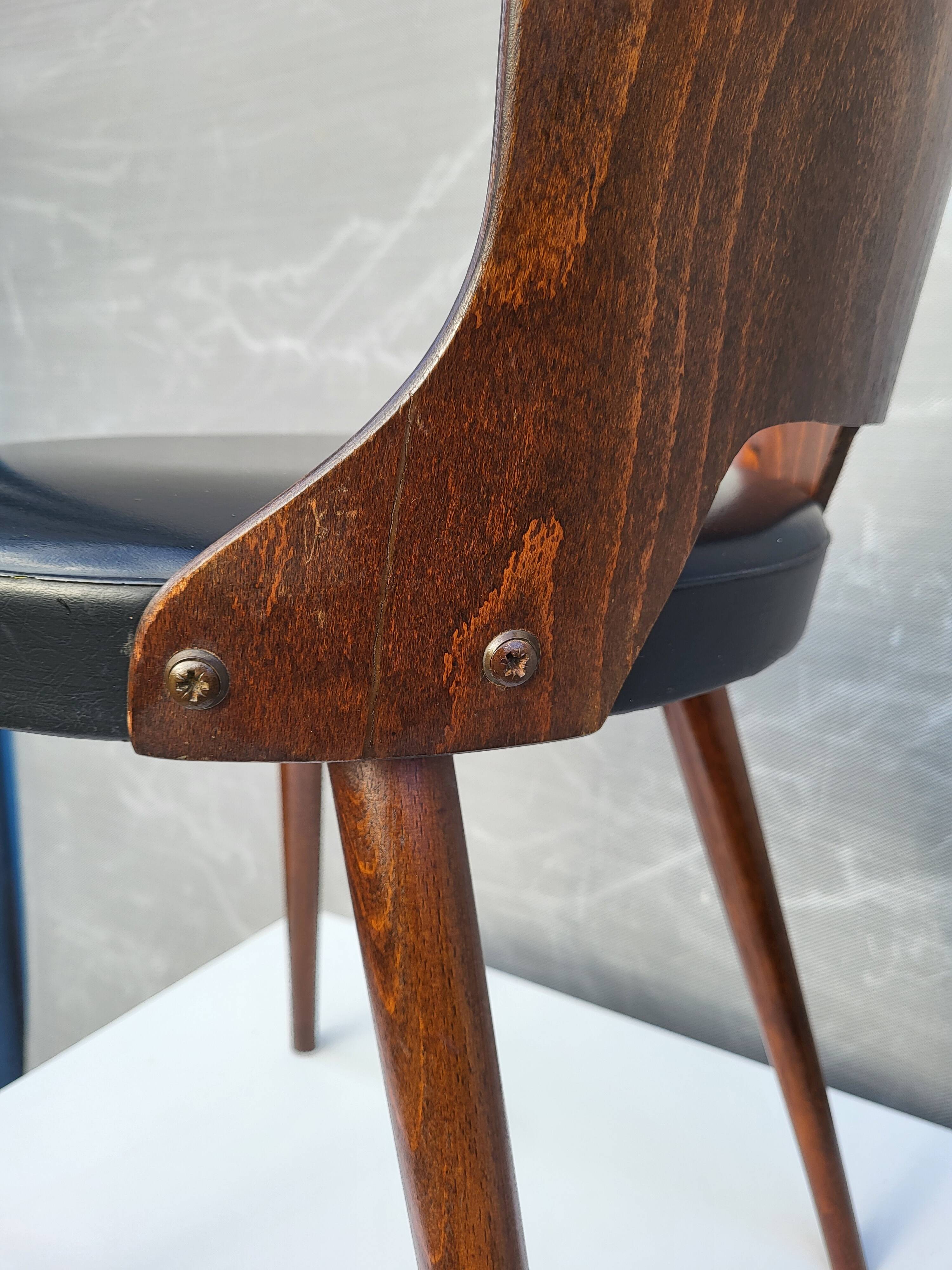 Pair of Dove chairs • Baumann • Black faux leather