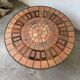 Capron “herbarium” coffee table with metal base
