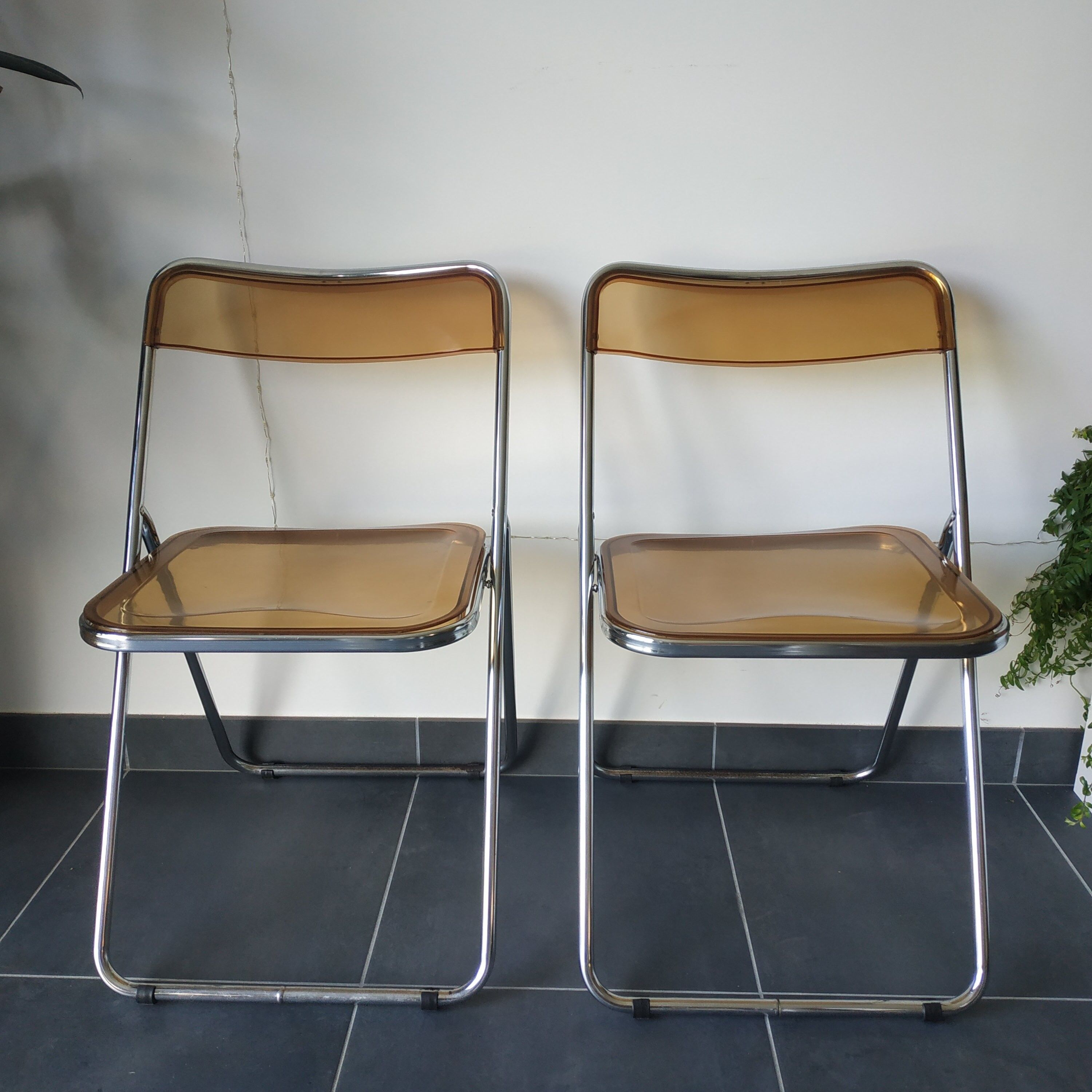 Seventies stainless steel and caramel chairs