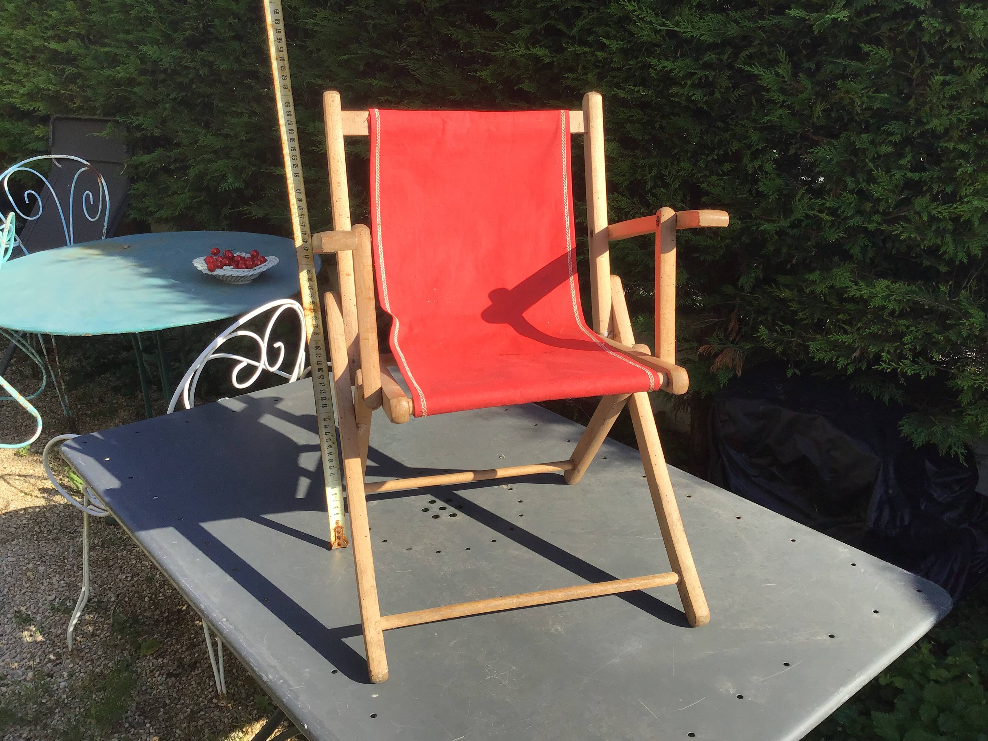 Small folding children's armchair in beach canvas