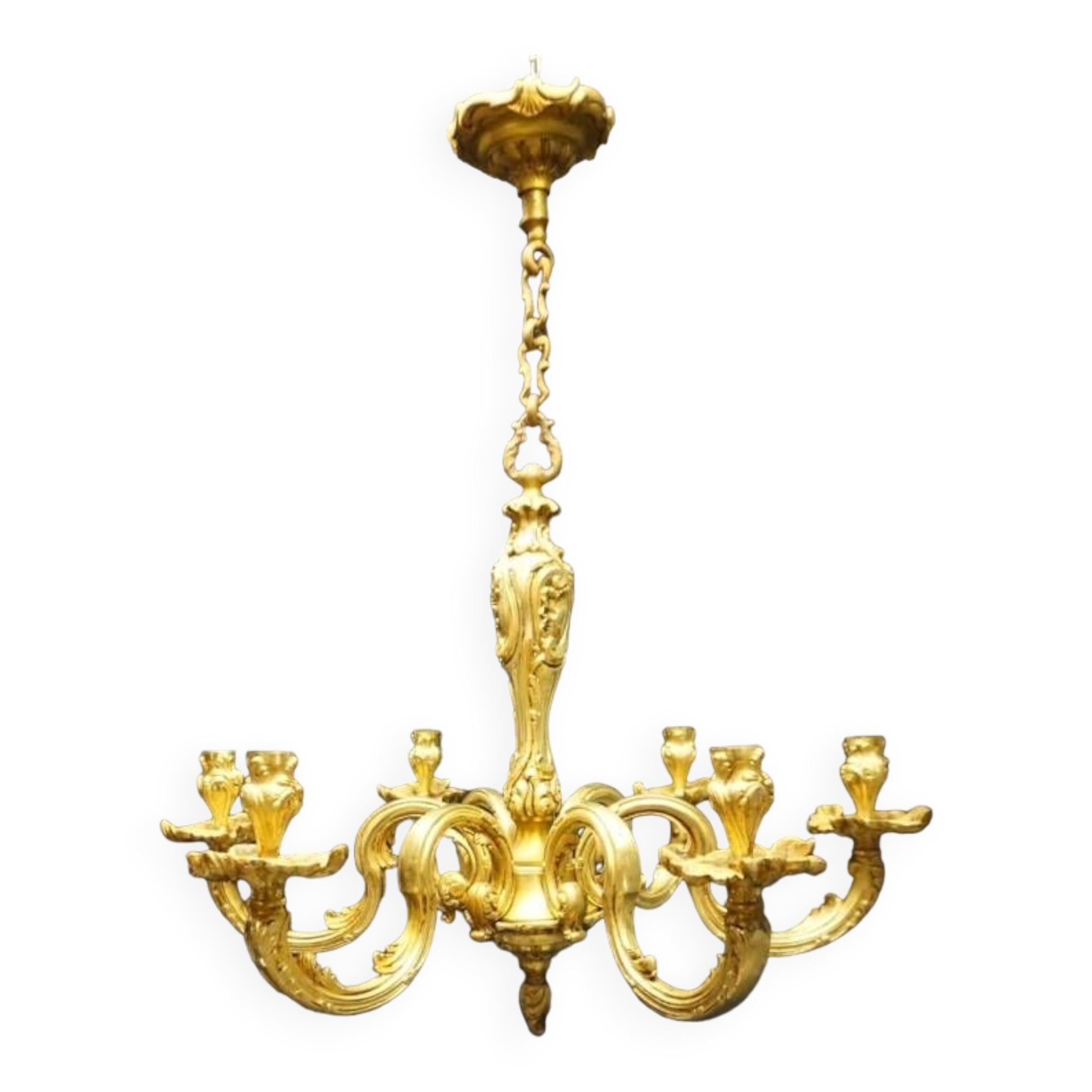 Massive bronze chandelier for candles.