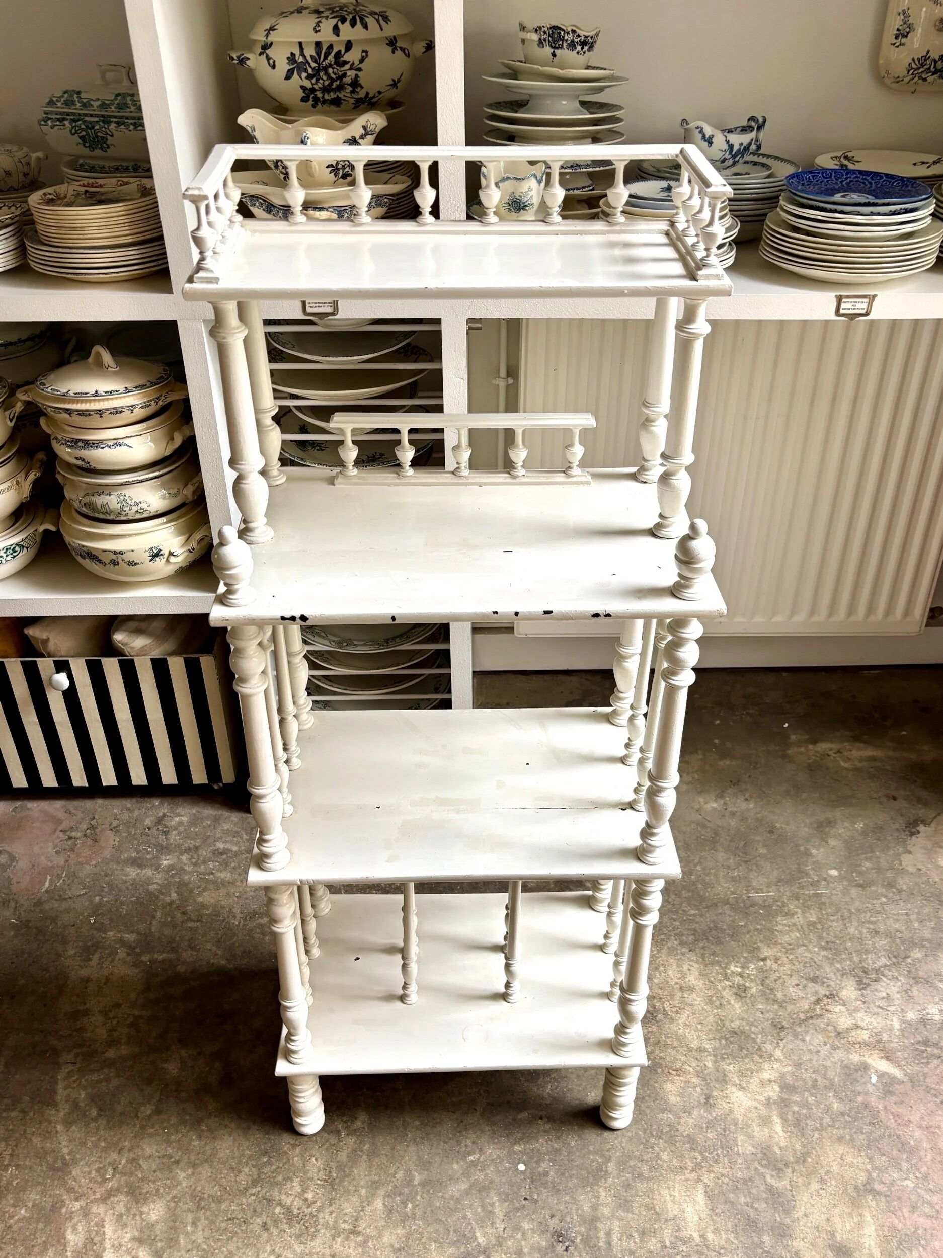 Library, white wooden sheet music cabinet.