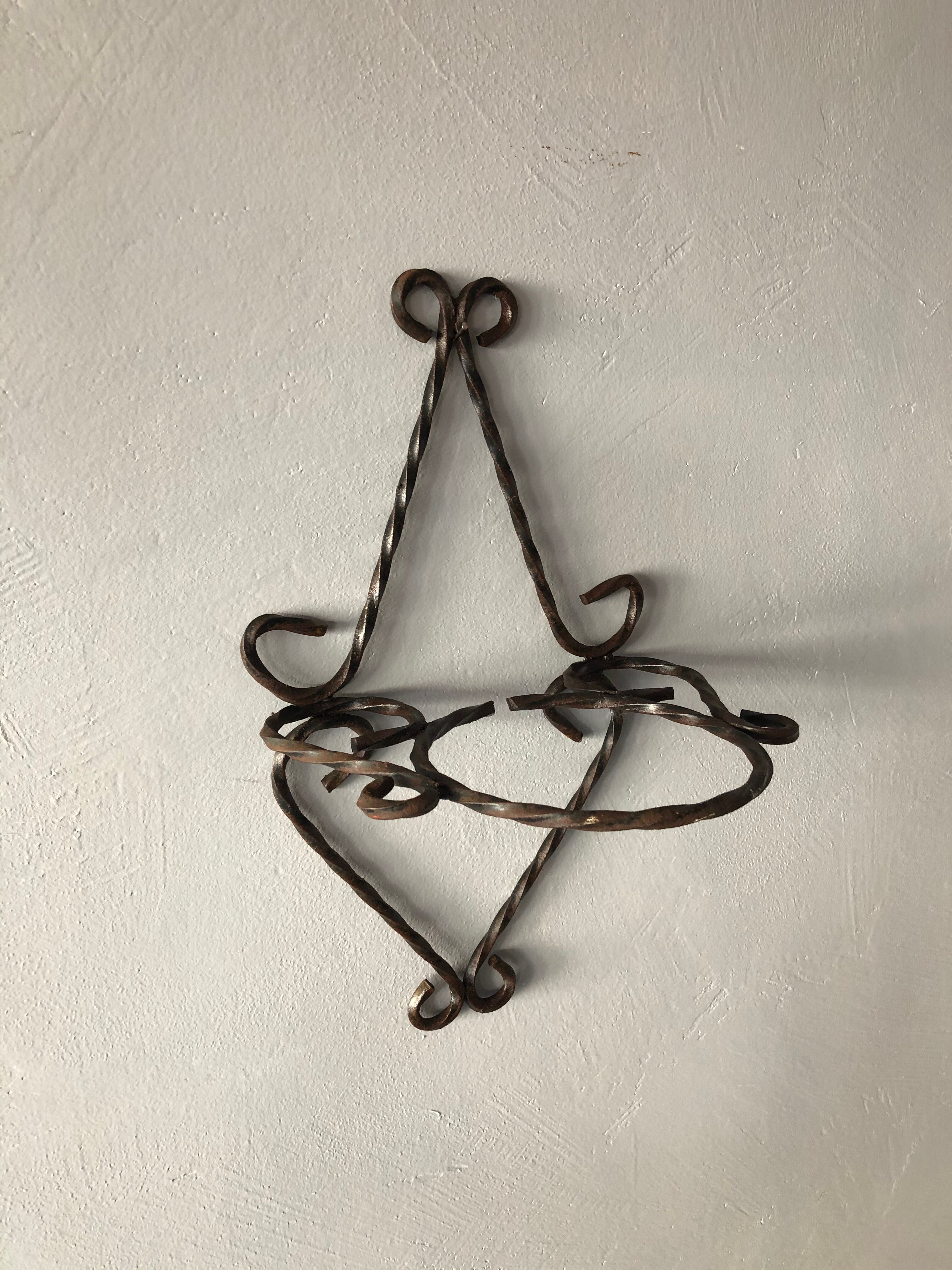 Wrought iron wall plant holder