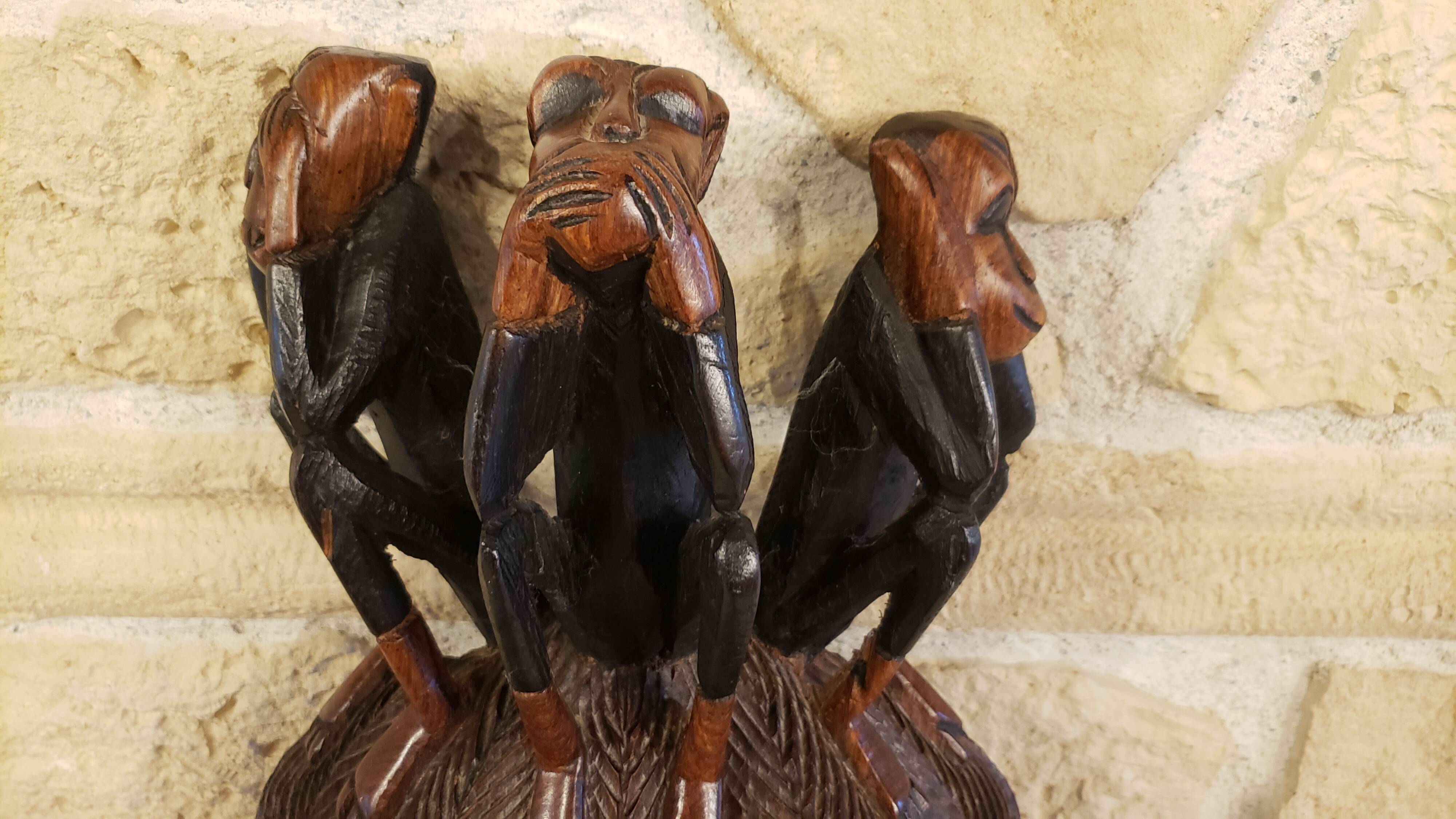 Old large African wall mask in carved wood