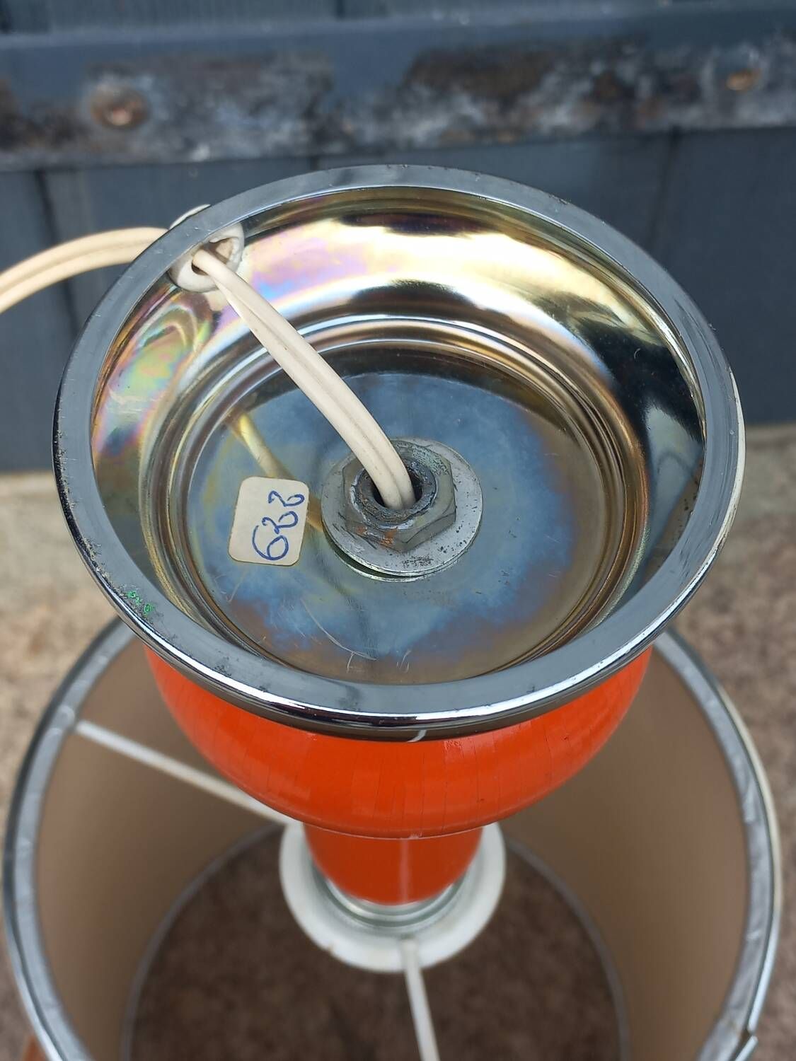 Designer lamp from the 70s in chrome metal and orange lacquered wood