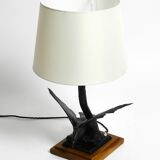 1940s table lamp made of iron in the shape of an eagle, teak wooden base