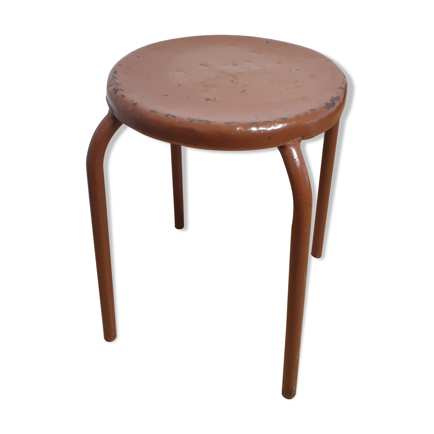 Rust-colored painted metal stool