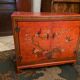 Low sideboard with lacquered decoration with birds on orange background Far East China Japan