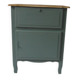 Meuble vintage en vert fumé, plateau bois.