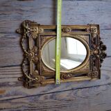 Old small golden mirror