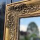 Miroir Empire en bois stuqué et doré, début XIXème siècle
