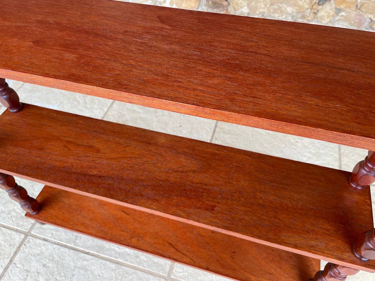 Vintage 5-tier turned wood shelf on legs.