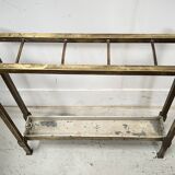 Brass and sheet metal umbrella stands from the 20th century.