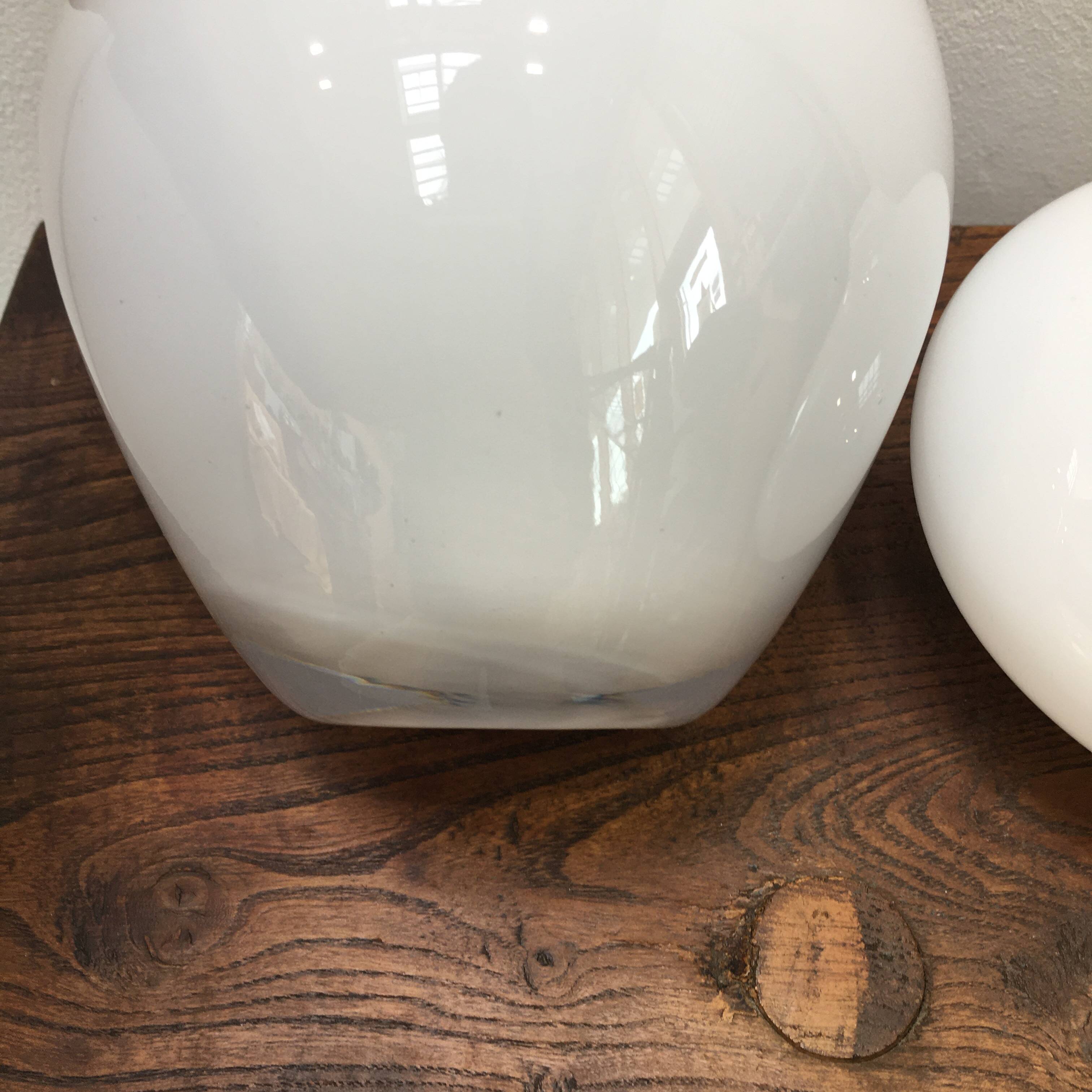 Duo of soliflore vases in white blown glass