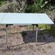 Water green formica table with 2 drawers and extensions