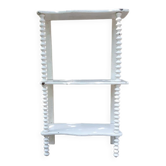 charming curved shelf with 2 turned wooden supports
