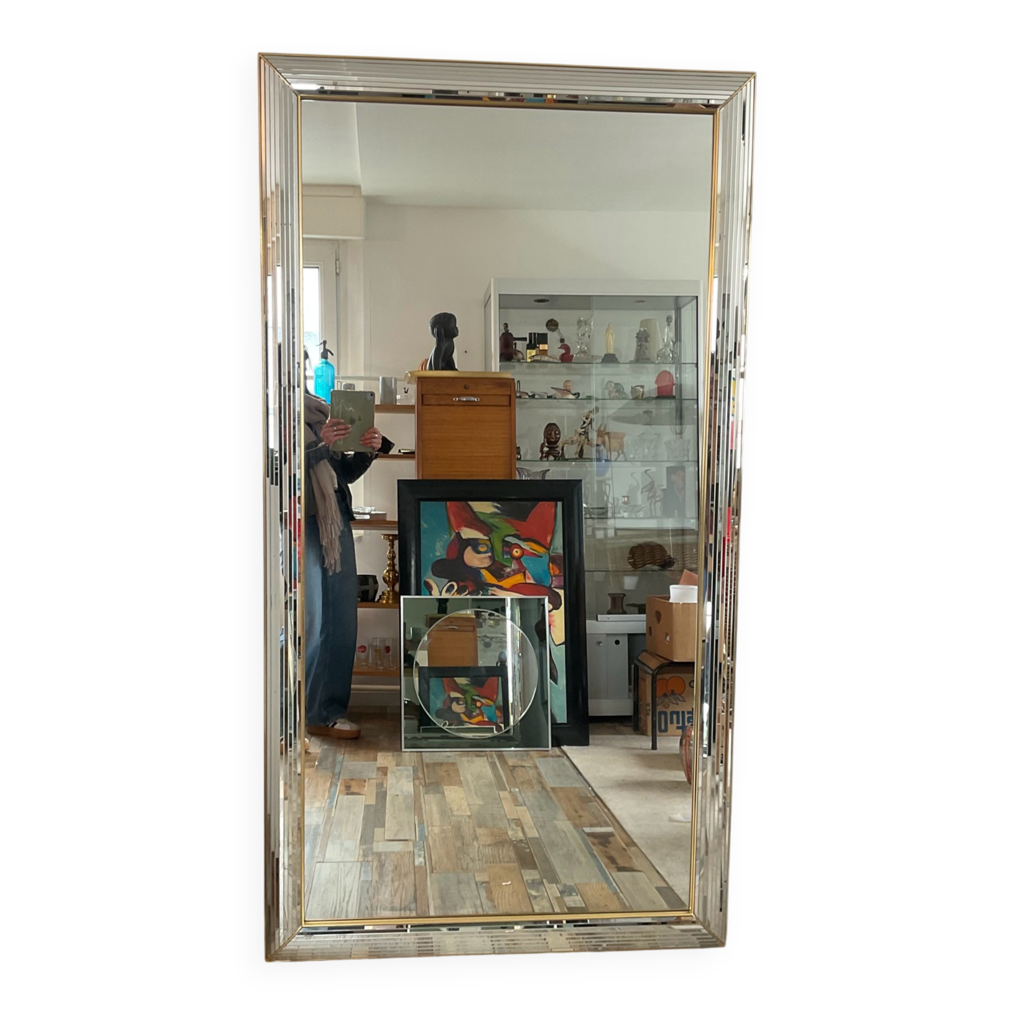 Large vintage Hollywood Regency style mirror with shutters.