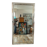 Large vintage Hollywood Regency style mirror with shutters.