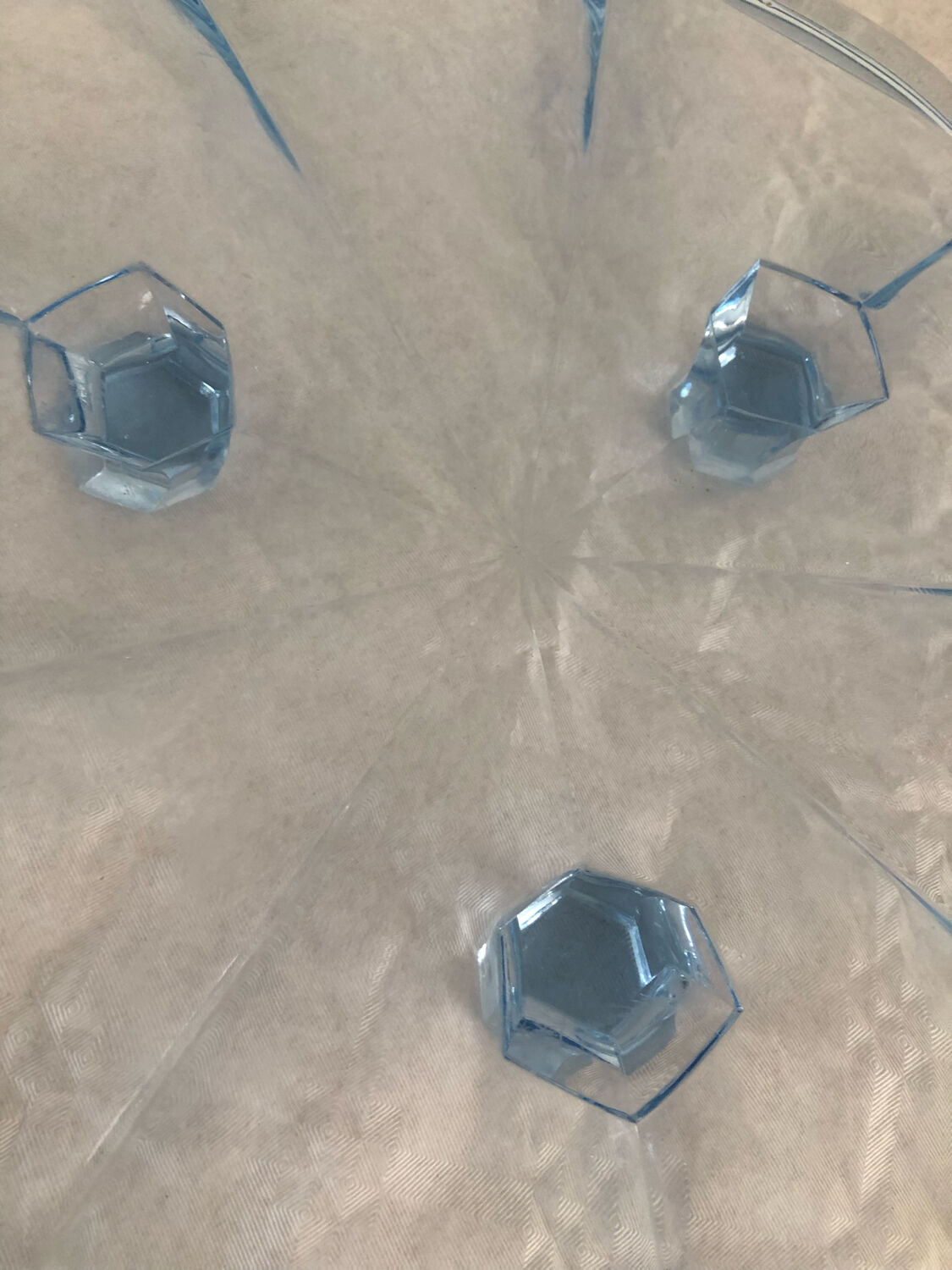 Blue transparent glass pie dish on vintage stand