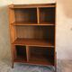 1960's vintage bookcase blond walnut and compass feet