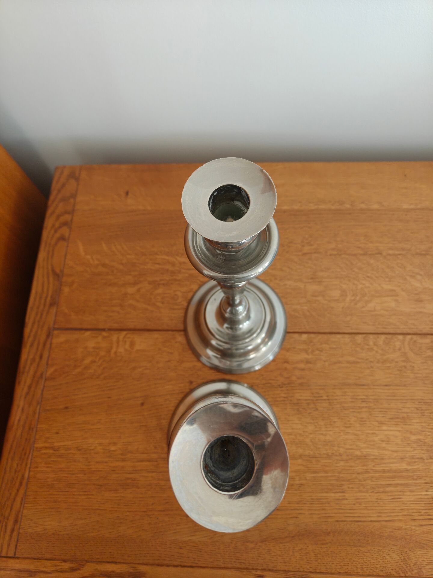 Pair of antique silver-plated candlesticks