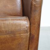 Brown Aviator design armchair made of cowhide leather