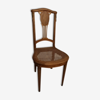 Chaise loupe cannée bronze