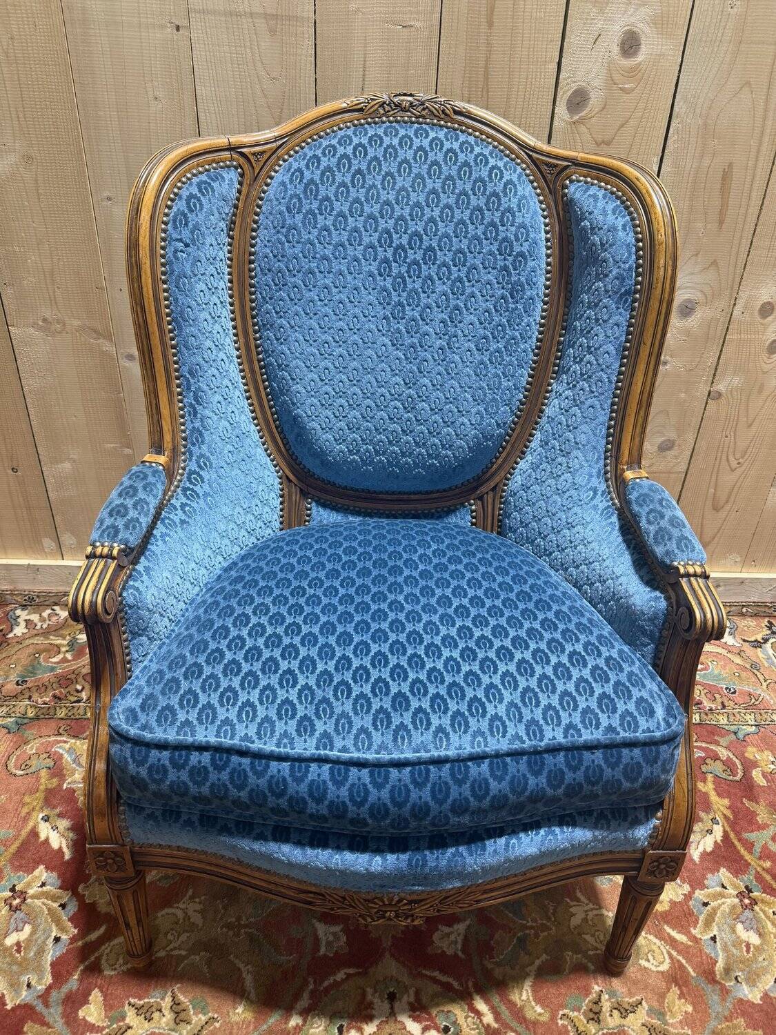 Louis XVI style blue velvet wingback armchair