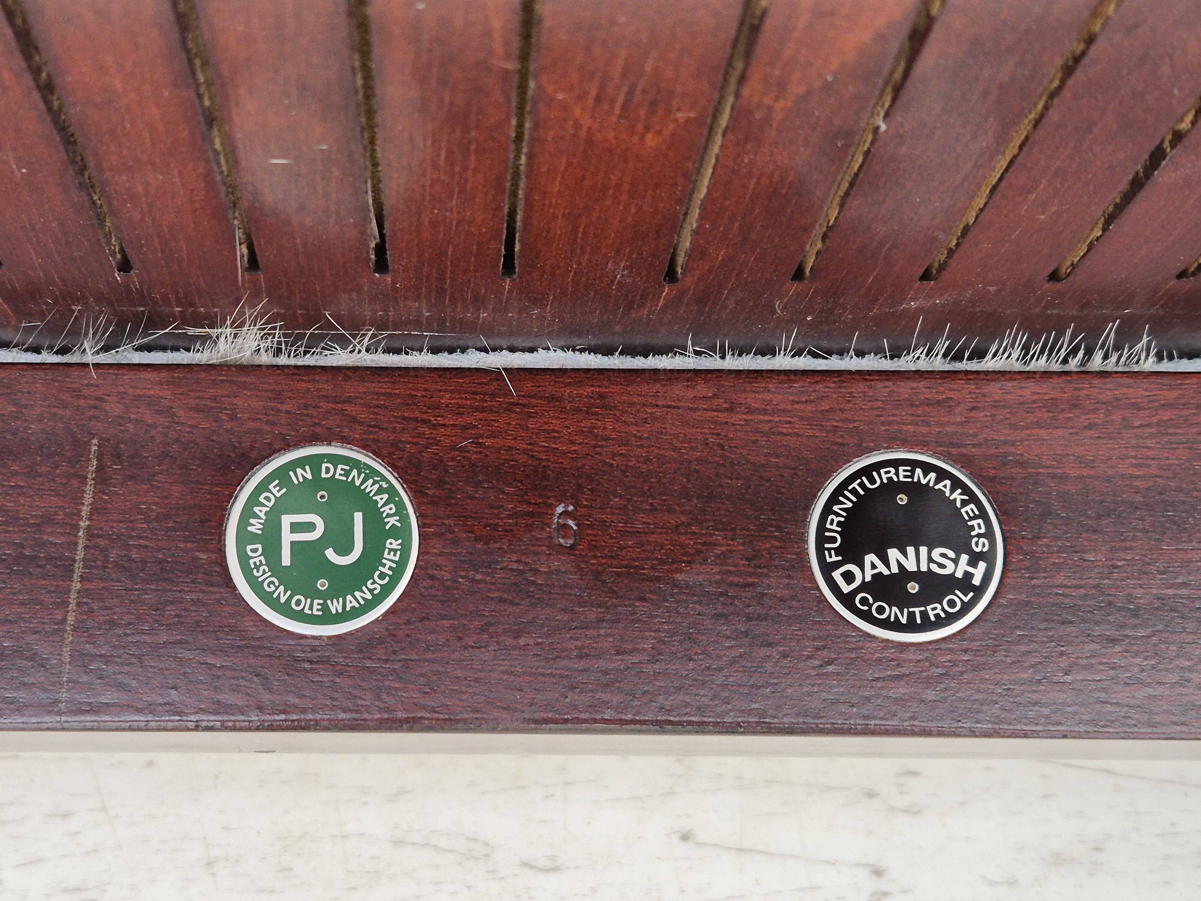 1960s, Danish design by Ole Wanscher, armchair, mahogany wood, cowhide, reupholstered.