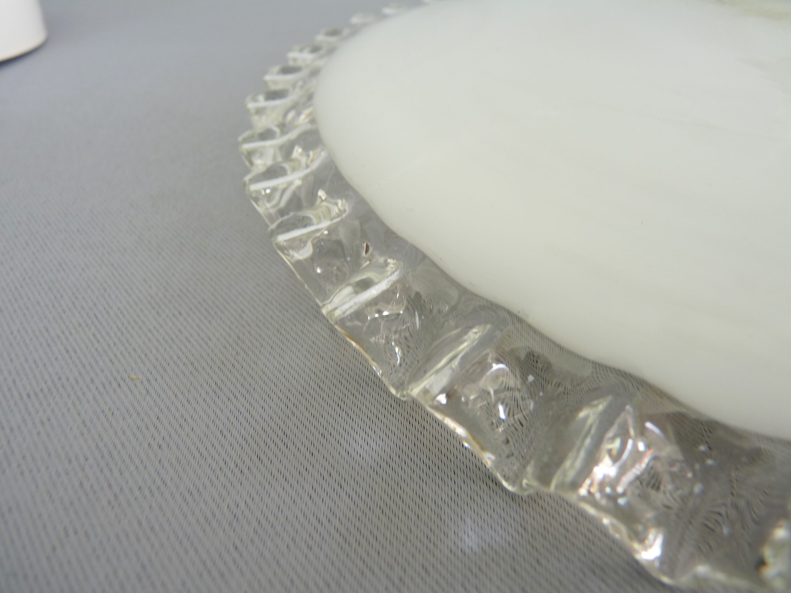 Flat white opaline hanging with transparent toothed collar