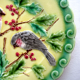Art Deco slip plate yellow background Sarreguemines: 2 Birds pecking holly