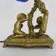 Vintage bronze table lamp featuring a painter on a mirror from the 1960s.