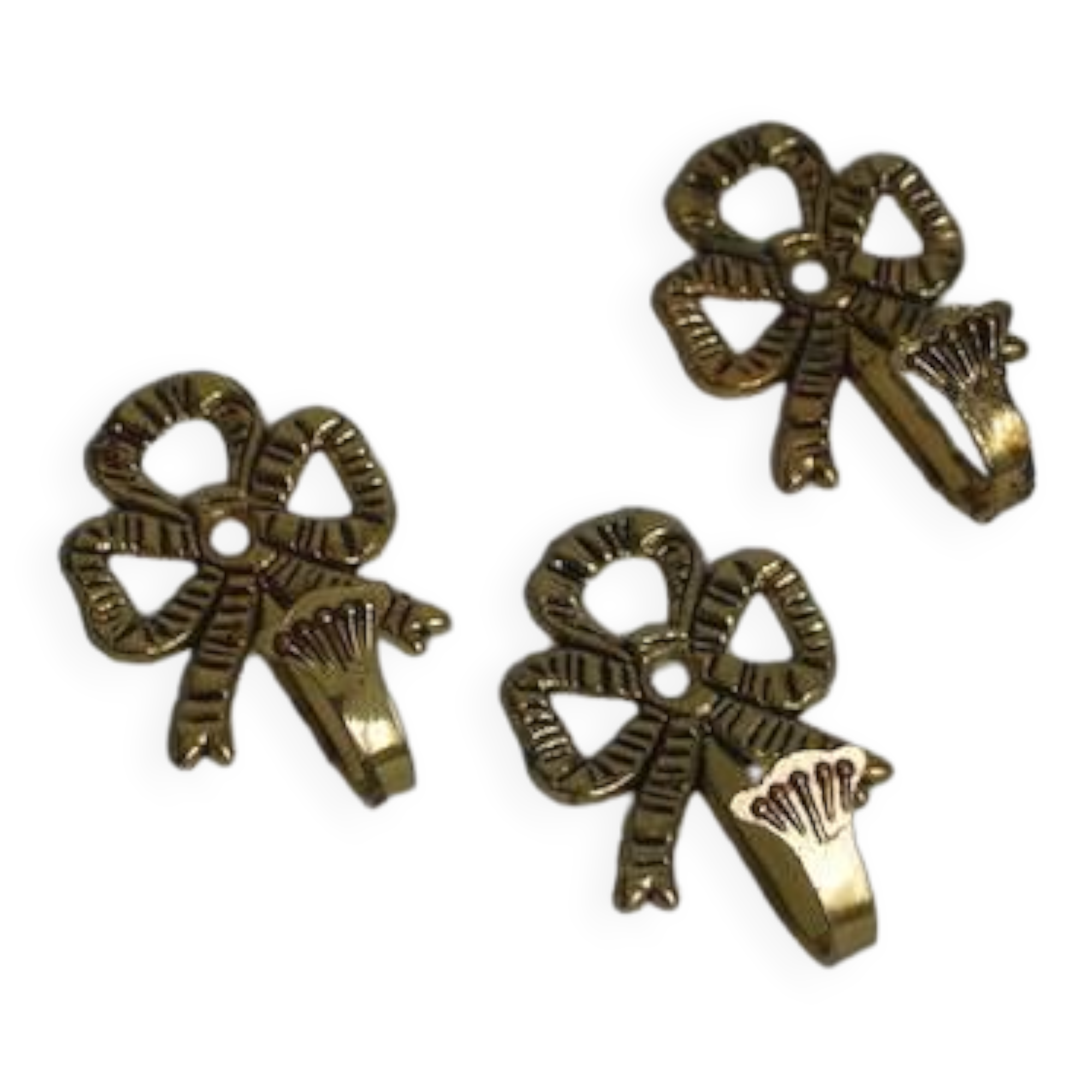 Trio of brass coat hooks