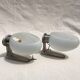 Pair of brushed steel appliques, half-egg opaline, 1970
