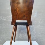 Pair of Dove chairs • Baumann • Black faux leather