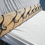 Teak coat rack with 8 double cast iron hooks