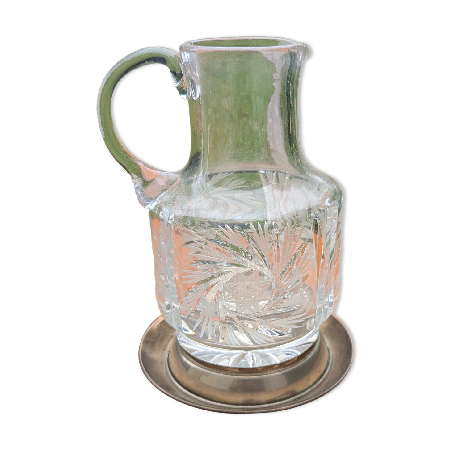 Jug / Carafe made of cut glass or crystal with its metal under-bottle.