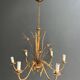 Golden Metal Chandelier with Reed Bouquet Decoration. Coco Chanel Style. Work