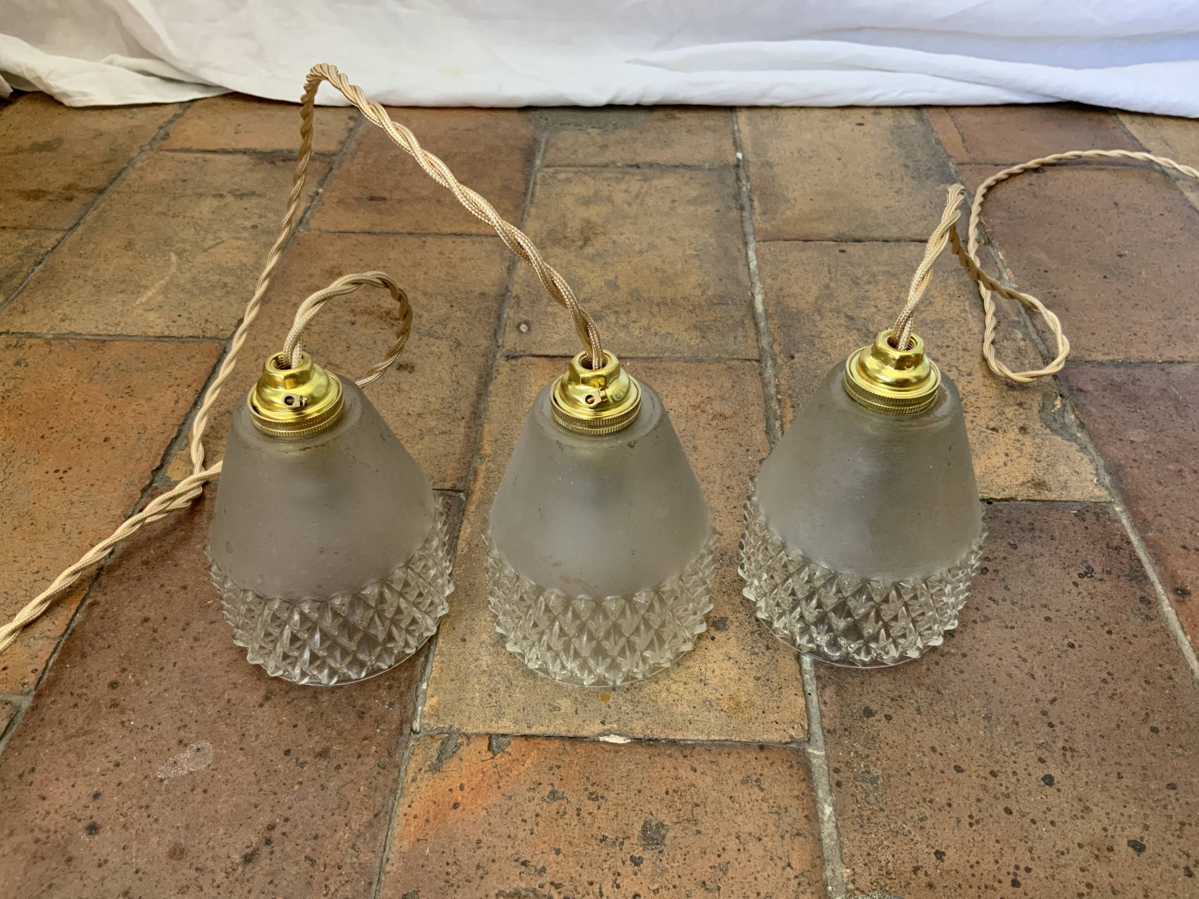 Trio of vintage suspensions